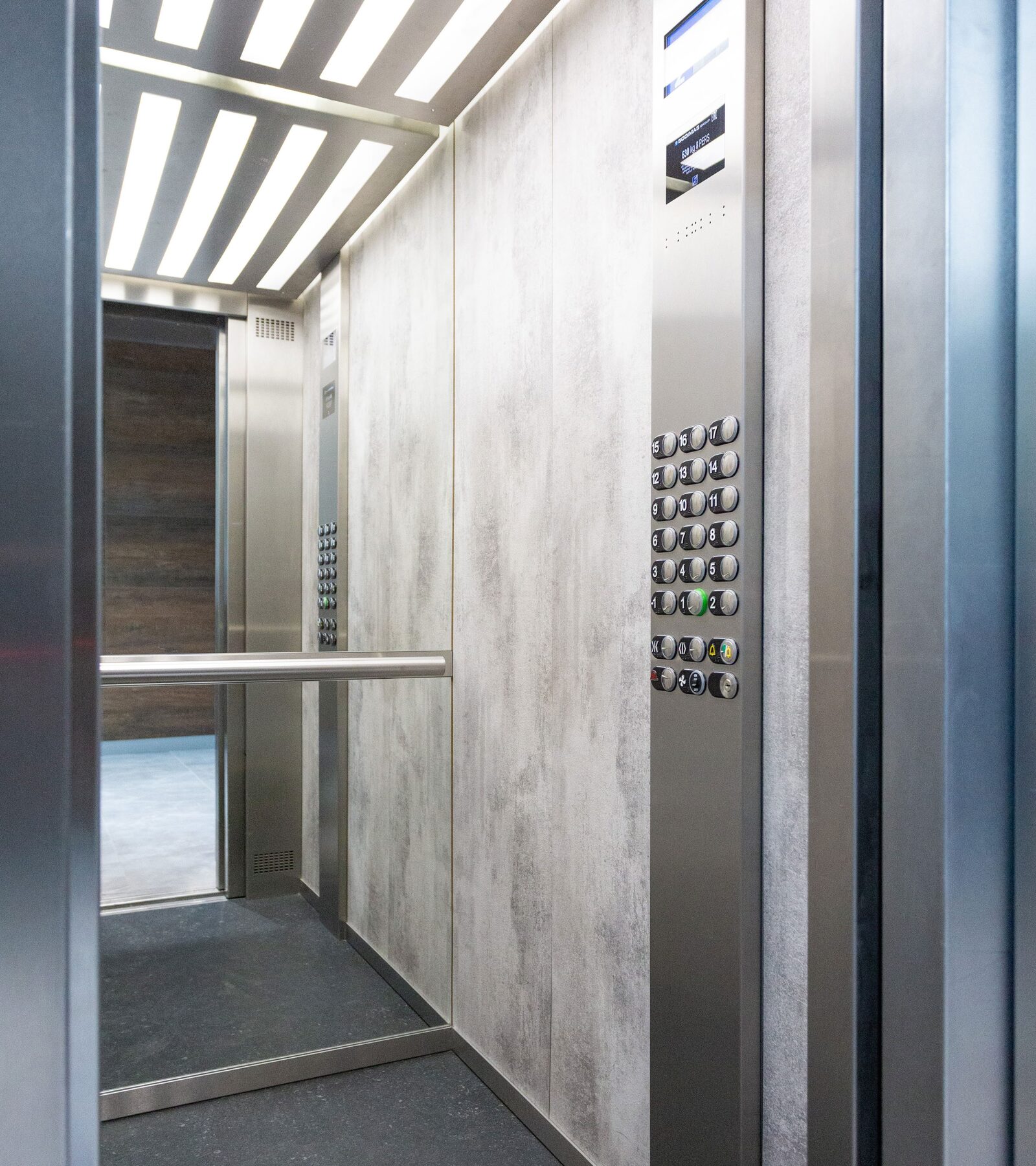 Modern elevator cabin with ELEVATIER measuring stopping accuracy to +2 mm